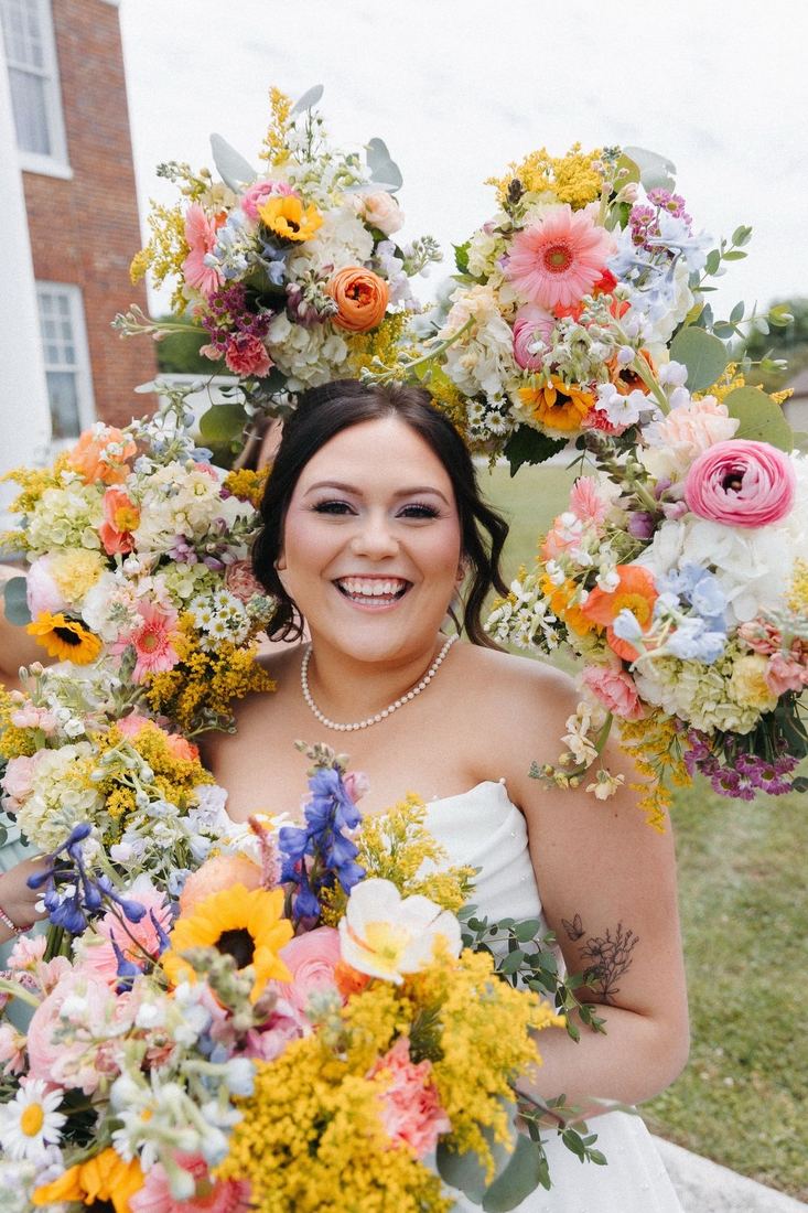 Bride with bridal bouquet, natural airbrush tan glow