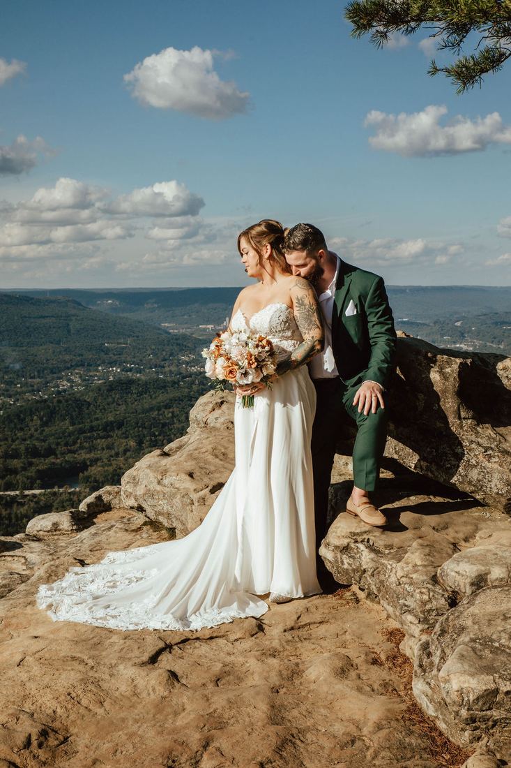 Bride and groom elopement portrait with mobile spray tan glow